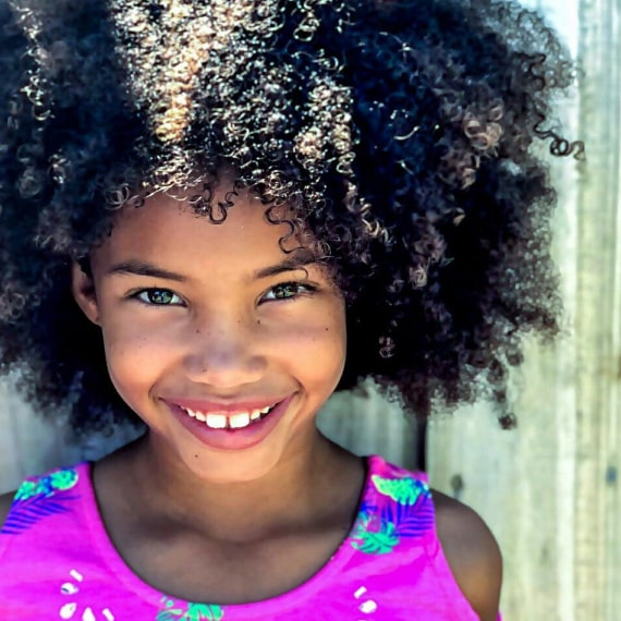 Young girl with curly hair